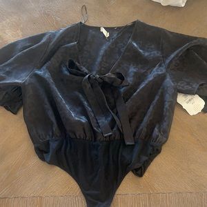 black leopard print body suit never worn